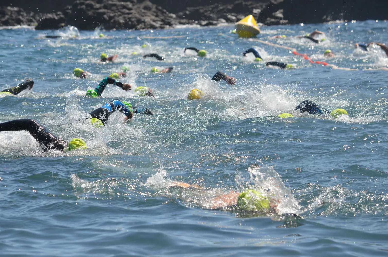 Triathlon swimmers in Lake Koronowo
