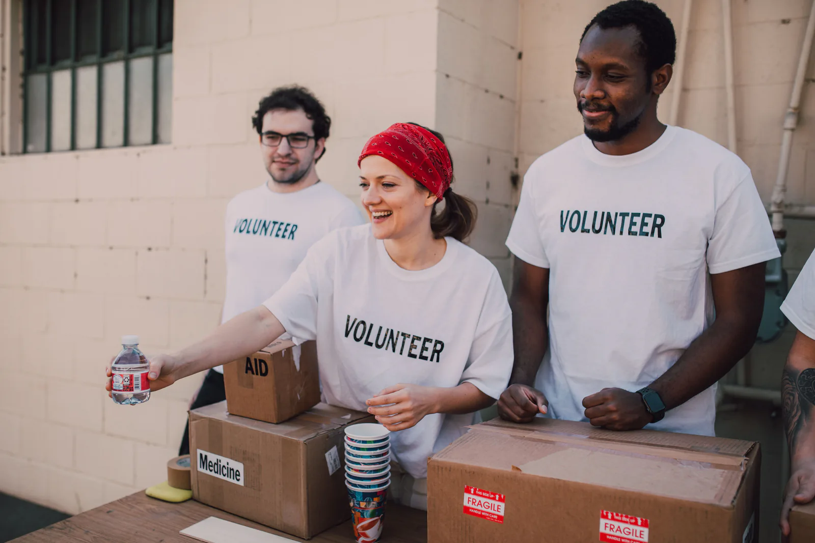 Volunteers distributing aid at a community event